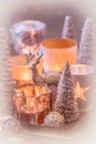 Christmas decoration and candle lights on a rusty tray Royalty Free Stock Photo
