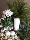 Christmas decoration with candle in silver, green and white