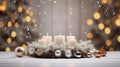 Christmas decoration with candles and baubles on bokeh background Royalty Free Stock Photo