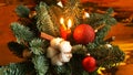 Christmas decoration with candles. Composition of Christmas tree branches Royalty Free Stock Photo