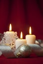 Christmas decoration with candles and ribbons