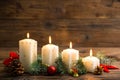 Christmas decoration with candles on the wooden table Royalty Free Stock Photo