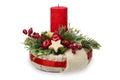 Christmas decoration - christmas composition made from wreath, candles and christmas decorative accessories isolated.