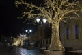 Christmas decoration of the city. Illuminated by colored lights