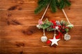 Christmas decoration - composition made from coniferous branches on the wooden background. Royalty Free Stock Photo