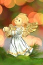 Christmas decoration, figure of little angel playing the harp Royalty Free Stock Photo