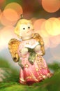 Christmas decoration, figure of little angel singing carols Royalty Free Stock Photo