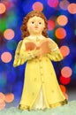 Christmas decoration, figure of little angel singing carols Royalty Free Stock Photo