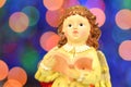 Christmas decoration, figure of little angel singing carols Royalty Free Stock Photo