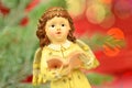 Christmas decoration, figure of little angel singing carols Royalty Free Stock Photo