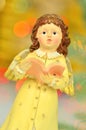 Christmas decoration, figure of little angel singing carols Royalty Free Stock Photo