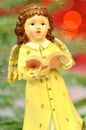 Christmas decoration, figure of little angel singing carols Royalty Free Stock Photo