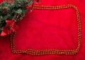 Christmas decoration fir branch on red Royalty Free Stock Photo