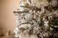 Christmas decoration with fir branch,silver Christmas ball and gift box.Beautiful green Christmas tree decorated with