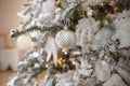 Christmas decoration with fir branch,silver Christmas ball and gift box.Beautiful green Christmas tree decorated with