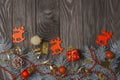 Christmas decoration with fir branches and red christmas balls on dark wooden background Royalty Free Stock Photo