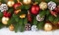 Christmas decoration on fir tree branch closeup, gifts, xmas ball, cone and other object on white blank space fur, holiday concept Royalty Free Stock Photo