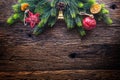 Christmas. Christmas decoration fir tree with star jingle bell and pine cone on rustic wooden table Royalty Free Stock Photo