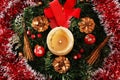 Christmas decoration in the form of a candle and a wreath Royalty Free Stock Photo