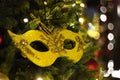 Christmas decoration in the form of a mask on the Christmas tree Royalty Free Stock Photo