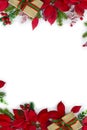 Christmas decoration. Frame of gift boxes, red poinsettia flowers, christmas tree branch, red berries on a white background Royalty Free Stock Photo