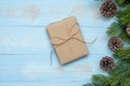 Christmas decoration, gift box and pine tree branches on wooden background, preparation for holiday concept, Happy New Year and Xm Royalty Free Stock Photo