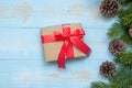 Christmas decoration, gift box and pine tree branches on wooden background, preparation for holiday concept, Happy New Year and Xm Royalty Free Stock Photo