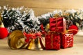 Gifts tree branches and bells on wooden boards, Christmas Decoration