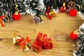 Christmas Decoration, Gifts tree branches and bells on wooden boards