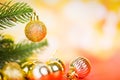 Christmas decoration with golden balls light gold abstract holiday background - christmas tree festive xmas winter and Happy New Royalty Free Stock Photo