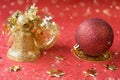 Christmas decoration. golden bells and red ball Royalty Free Stock Photo