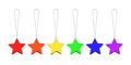 Christmas decoration hanging stars baubles set LGBTQ community rainbow flag color white background isolated closeup, LGBT New Year Royalty Free Stock Photo