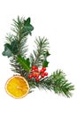 Christmas decoration with holly and dried orange.