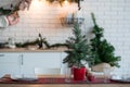 Christmas decoration of the kitchen of the house in the loft style. Royalty Free Stock Photo