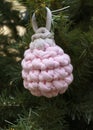 Christmas decoration made of wool hanging on a Christmas tree. Handmade, wickerwork Royalty Free Stock Photo