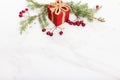 Christmas decoration marble background top view. Merry Christmas greeting card, frame. Winter xmas holiday theme. Royalty Free Stock Photo