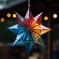 Christmas decoration, multicolored hanging star ornament, star-shaped glass lantern, Royalty Free Stock Photo