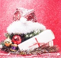 Christmas decoration on red background for post card greetings, toy design on tree macro xmas, ball and drum Royalty Free Stock Photo