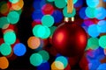 Christmas decoration, red ball, bokeh effect background. New year. Soft focus.