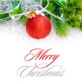 Christmas Decoration with Red Ball, Green Fir Branch and White Lights in Snow. Greeting Card Royalty Free Stock Photo