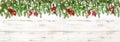 Christmas decoration red berries golden lights Holidays banner Royalty Free Stock Photo