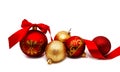Christmas decoration red and gold yellow balls with ribbon isolated on a white Royalty Free Stock Photo