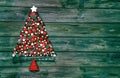 Christmas decoration in red and green: tree of balls on wooden b Royalty Free Stock Photo