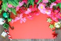 Christmas decoration, red paper and flower on wooden Background