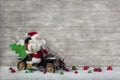 Christmas decoration: Red santa claus in hurry to buy christmas Royalty Free Stock Photo
