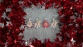 Christmas decoration. Red and silver Twisted Tinsel Garland as a frame. Silver glitter background Royalty Free Stock Photo
