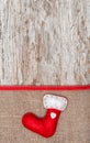 Christmas decoration with red sock and burlap Royalty Free Stock Photo
