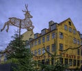 Christmas decoration of a reindeer jumping over the Nyhavn 17 restaurant in Copenhagen