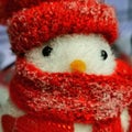 A Christmas decoration representing a little bird with a red hat and scarf Royalty Free Stock Photo