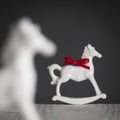 Christmas decoration, rocking horses, porcelain figurine Royalty Free Stock Photo